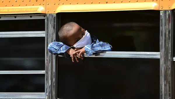 A boy from the Miskito ethnic group in Honduras leaves Tegucigalpa for his home community of La Mosquitia after his parents lose their jobs due to the COVID-19 pandemic.