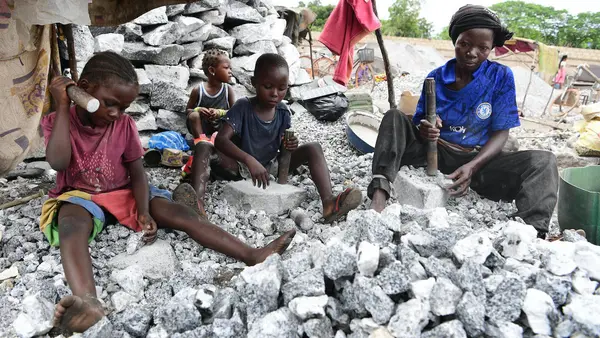 Children and parents often work side by side in the mines in Burkina Faso.