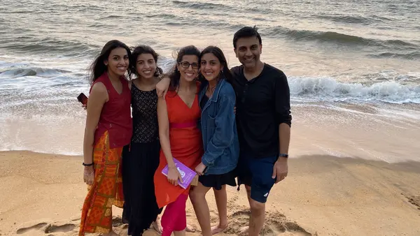 People Posing on a Beach
