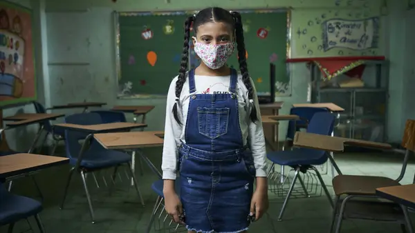 A student photographed in an empty classroom in Panama City, Panama, on Sept. 16, 2020.