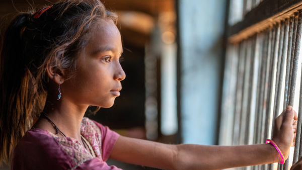A young girl in Gujarat, India who has lost both parents receives alternative care and mental health and psychosocial support through UNICEF coordinators.
