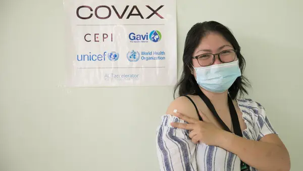 On March 10. 2021, Dr. Paula Syrah Esguerra, 37, fellow-in-training for maternal-fetal medicine at Dr. Jose Fabella Memorial Hospital in Manila, gets her first dose of the COVID-19 vaccine provided by the COVAX Facility. 