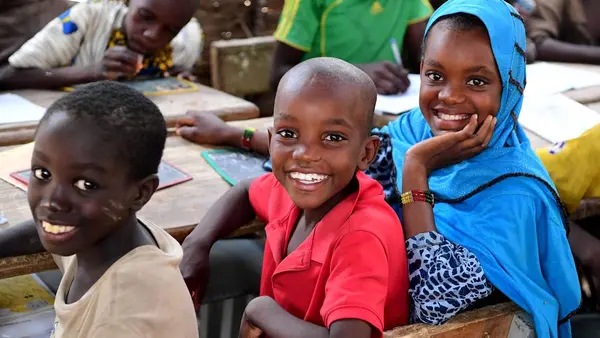 Three Children Smiling