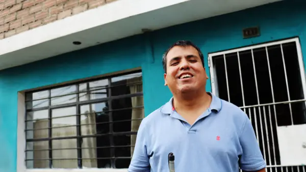 In Lima, Peru, teacher Carlos Espinoza, who lost his sight at an early age, works with refugee children in a program run by UNICEF and funded by Education Cannot Wait (ECW).