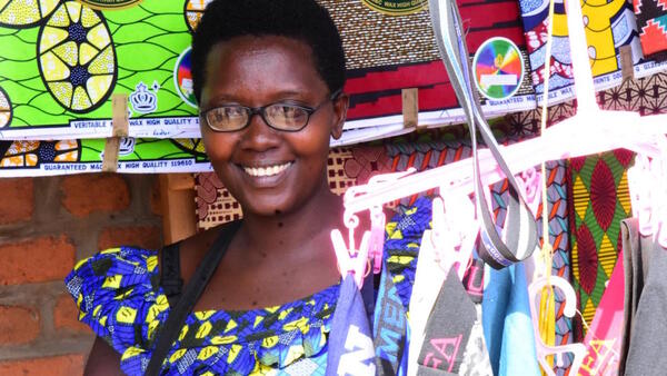 Jeanine Nijimbere at her stall at the central market in Mahama Refugee Camp in eastern Rwanda in 2021.