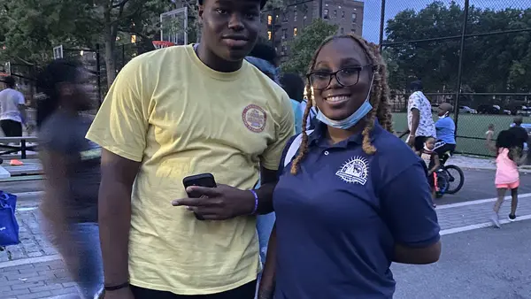 Two youth participants in the Arthur Ashe Institute for Urban Health's mental health and wellness workshops and peer mentor training program, supported by UNICEF USA.