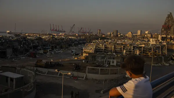 Boy Overlooking City