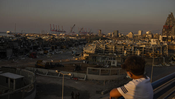 Boy Overlooking City