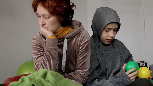 Svitlana and her son Petro, who has a severe form of autism, at the UNICEF-supported Start Center for displaced  children with special needs and their families in Lviv, Ukraine. 