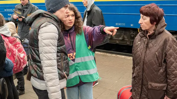 Girl Giving Adults Directions