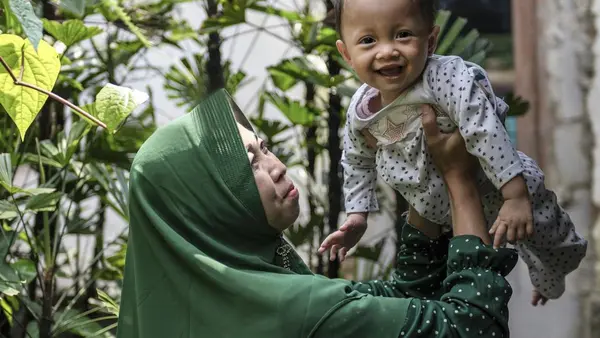 After eight weeks of treatment with locally produced Ready-to-Use Therapeutic Food, little Adifa was no longer severely malnourished in West Java Province, Indonesia. 