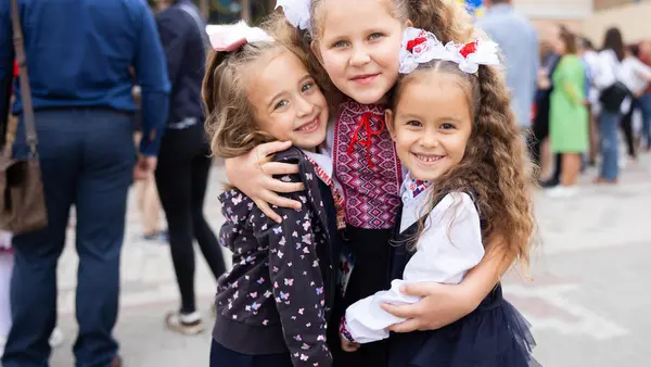 On Sept. 2, 2022, at School No. 17 in Irpin, Ukraine, children are excited to begin their first day of the new school year. 