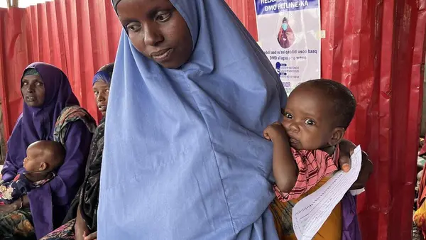 Woman Holding Baby