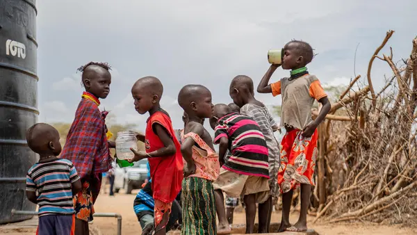 Children at Sopel Primary School in Turkana County, Kenya, get safe water from a solar water system rehabilitated by UNICEF. 