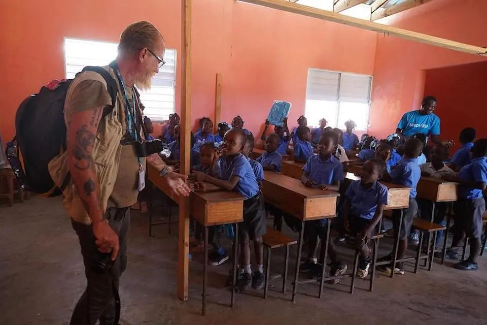 Photographer Jan Grarup, above visiting a school in Haiti, traveled to three continents to document the life-changing impacts of UNICEF’s supply and logistics operation. “Working [on this project] gave me an insight into how massive an operation it can be, to get supplies across huge distances to remote areas, whether it’s school supplies, COVID-19 vaccines or warm clothes for children in Lebanon and refugees who came from Syria,” he said. View a special exhibition of his work here. 