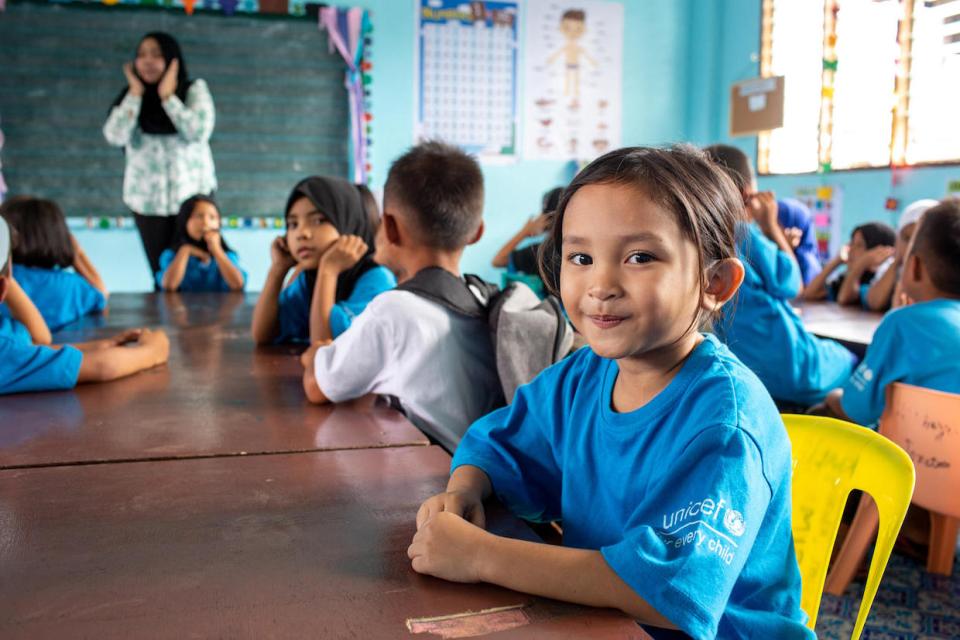 Janna, 9, attends her Grade 1 class at Sultan Disomimba Elementary School, close to the city of Marawi, in the Philippines. UNICEF has provided learning materials and other supplies to the school to help staff cope with the additional numbers of pupils and the crowded classrooms, and to keep the children in school and learning.