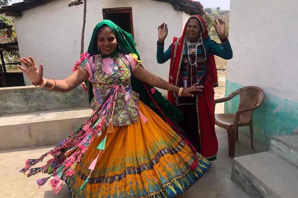 Navli Garasiya, a health care worker and member of the Garasiya tribe, dances to an adapted traditional tribal song that speaks about the benefits of the COVID-19 vaccine.