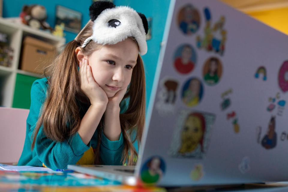 On 15 April 2020 in Kyiv, Ukraine, Zlata, 7, works on schoolwork from home, with all schools in the country closed as part of measures to combat the spread of COVID-19.