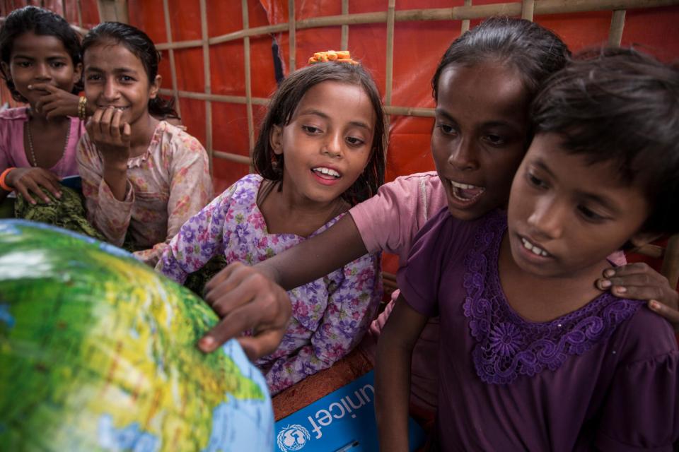 Students with School-in-a-Box materials at a Transitional Learning Center in the Uchiprang refugee camp, near Cox's Bazar, Bangladesh.