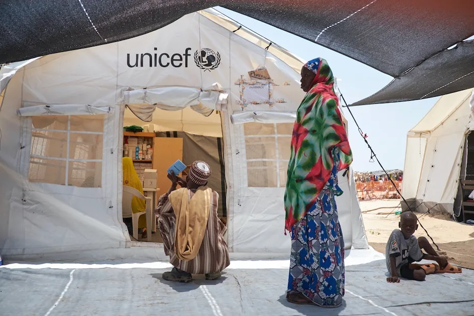 Patients wait for treatment at a UNICEF mobile health clinic in Garin Wazam, Diffa, Niger, where hundreds of thousands of people from around Lake Chad have fled to escape violence perpetrated by Boko Haram insurgents.