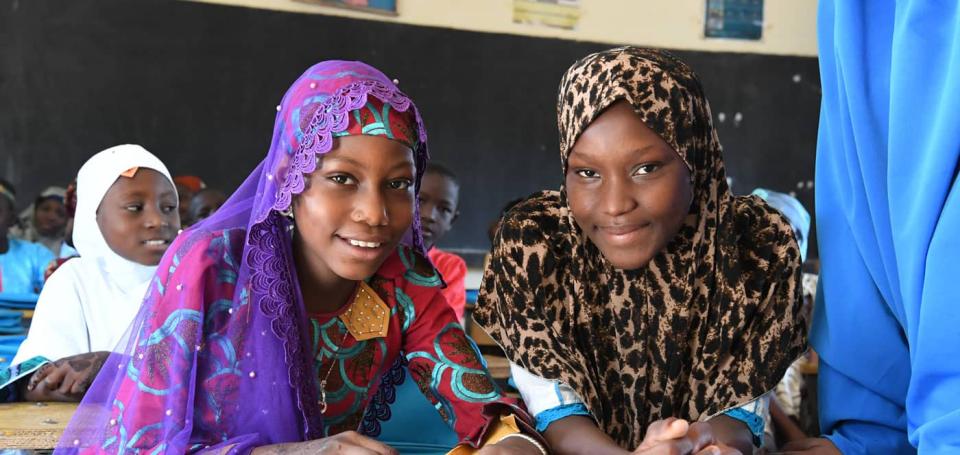 Friends Ramatou and Nafissatou attend class at the Noma school, in Maradi, south Niger.