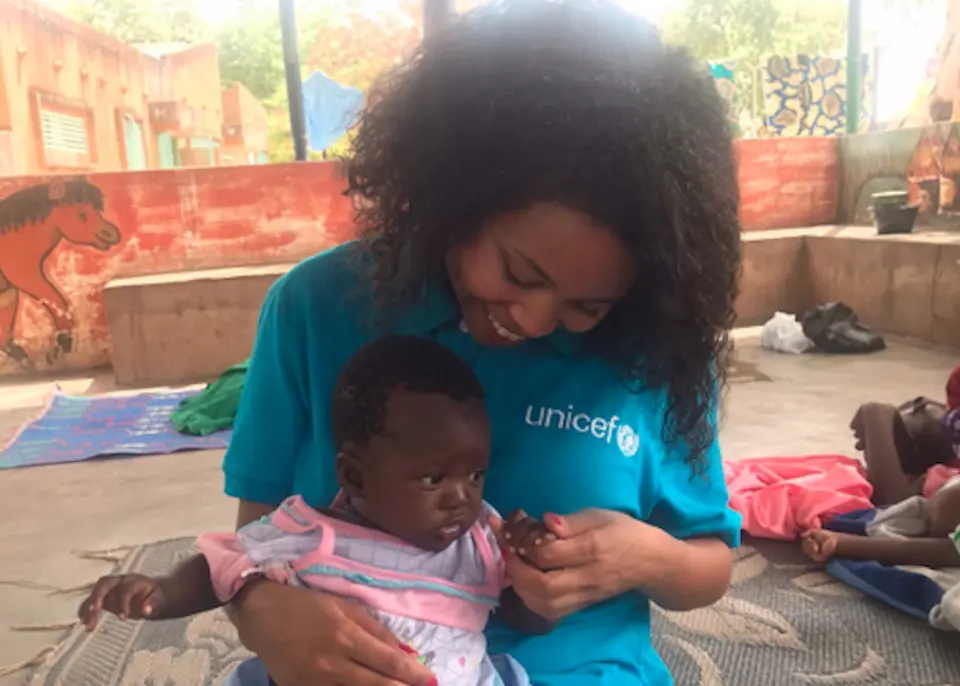 UNICEF USA's Brittany E. Taylor met Mali, a baby being treated for severe acute malnutrition, at a UNICEF-supported health center in Fada N'Gourma, Burkina Faso, in June 2022.