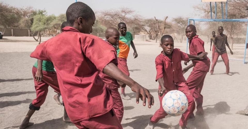 Students play football at the School of Peace, Kousseri internally displaced peoples site, Lake Region, Chad, Thursday 20 April 2017.