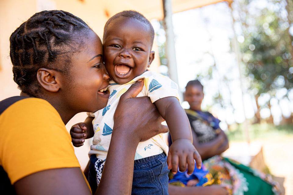 A mother and baby visit the growth monitoring clinic at UNICEF-supported Feni health facility in Zambia.