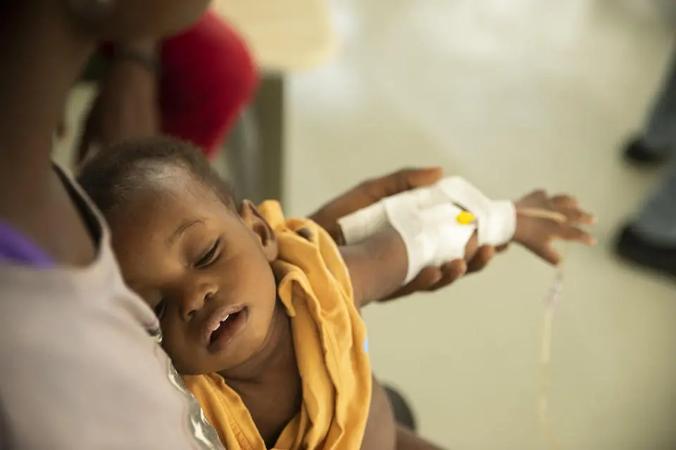 A young child is treated for cholera symptoms at a UNICEF-supported facility in Port-au-Prince, Haiti, on Oct. 14, 2022.