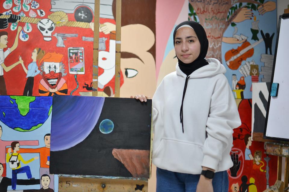 Tenth grader Masa, 16, has taken drama, music, painting and life skills classes at a UNICEF-supported Makani center in East Amman, Jordan. 