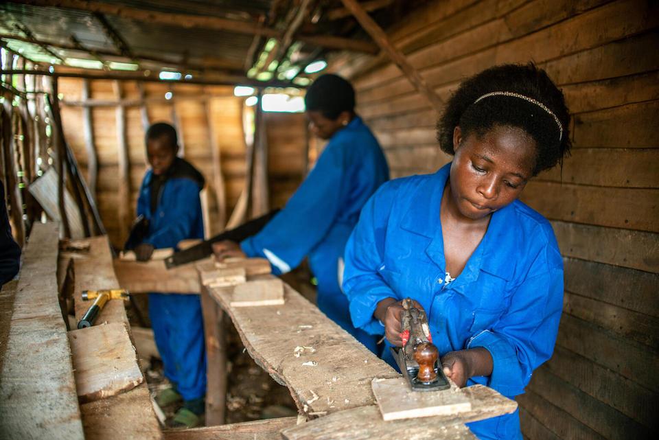 Furaha, 18, of South Kivu province, Democratic Republic of the Congo, trains to be a carpenter, part of a UNICEF-supported workshop aimed at empowering vulnerable youth in the country.