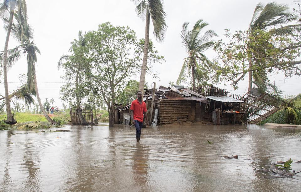 A man walks through his flooded village in the Nicoadala district, 35 km from Quelimane, Mozambique — an area that suffered severe damage from Cyclone Freddy which made its second landfall on March 11, 2023.