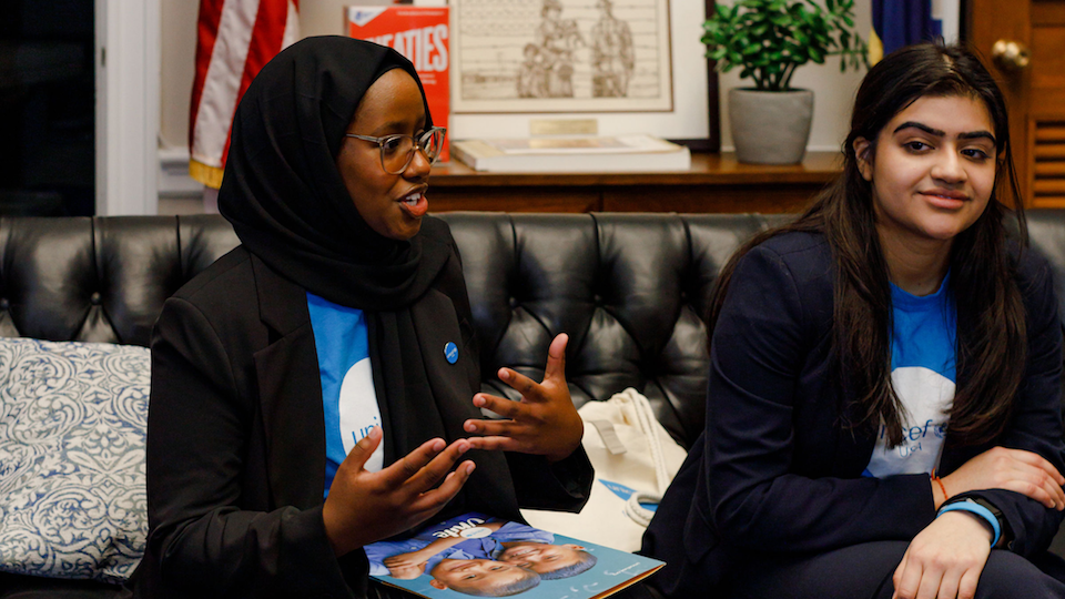 Youth volunteer Salmi Abdi, left, advocates for UNICEF in a meeting on Capitol Hill. 