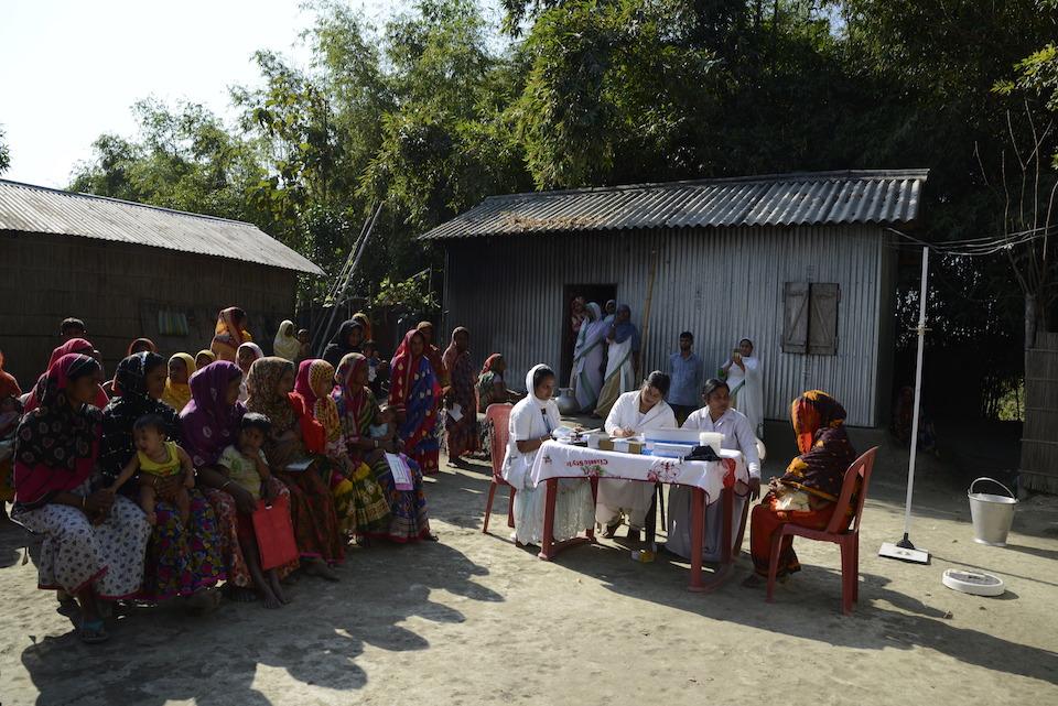 Health workers conduct a village health care day in Fulkakata village, Dhubri district, Assam, India. 