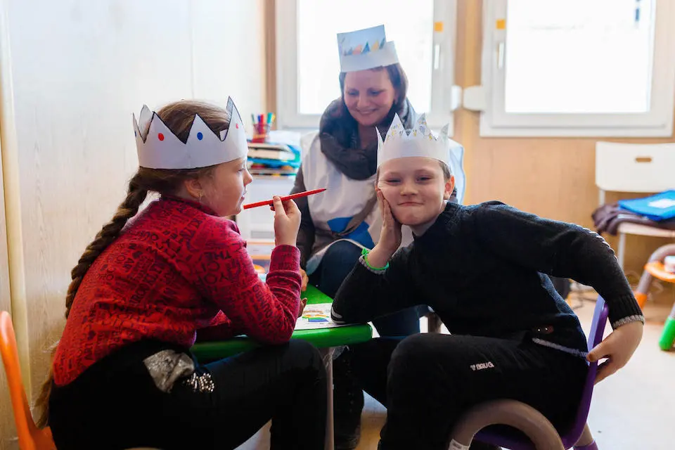 Children from Ukraine at a Blue Dot refugee support hub set up by UNICEF and UNHCR in Moldova.