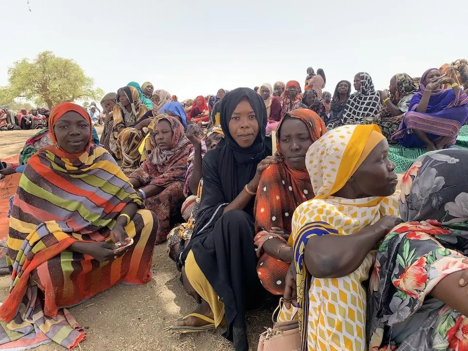 Refugees from Sudan wait to collect emergency supplies from UNICEF and partners in a Chadian village near the Sudanese border.