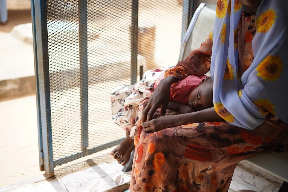 A mother and child at a UNICEF-supported health center in Sudan.