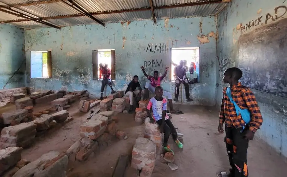 On May 4, 2023, children play in an empty school in Am Dafock, Central African Republic, an impoverished border community hosting thousands of Sudanese refugees.