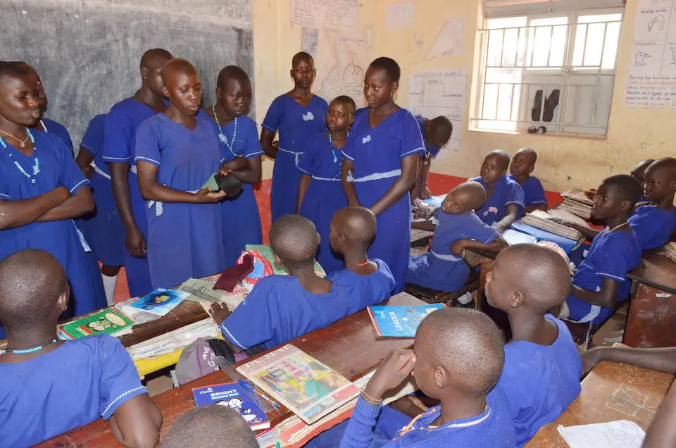 Students at Morulem Girls Primary School in the Abim District in Northern Uganda teach younger students about menstrual hygiene management.