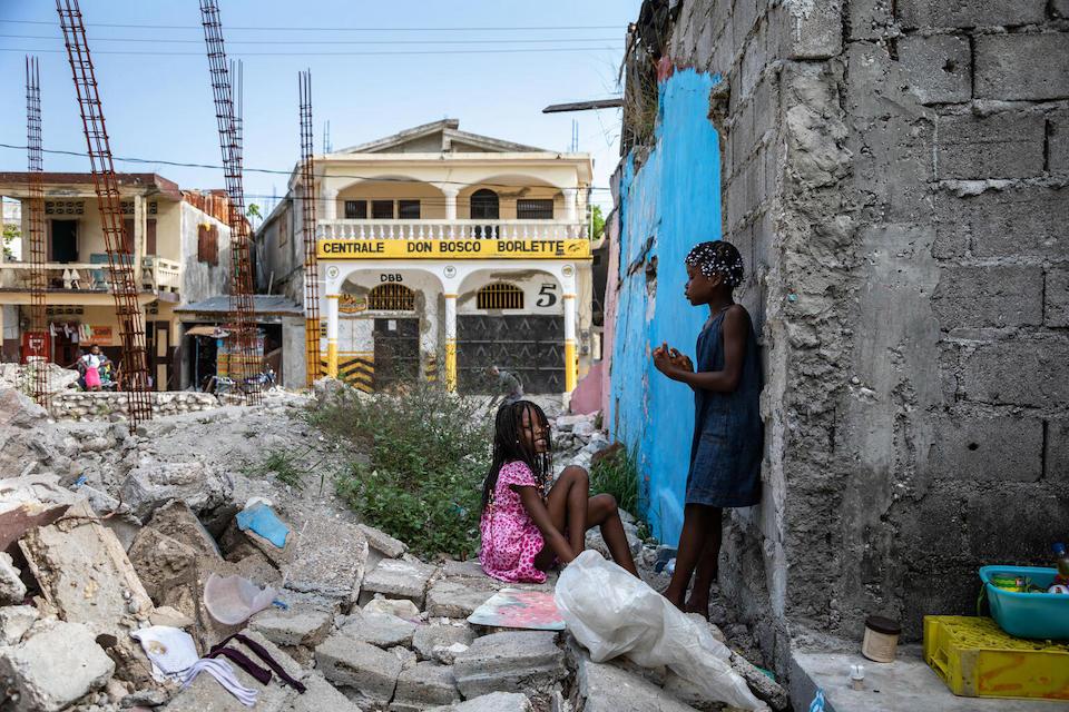 In Les Cayes, Haiti, children play in the rubble of homes destroyed in the 2021 earthquake.