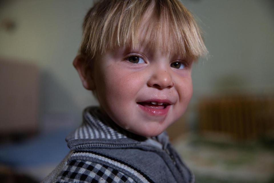 Artur, 2, whose family spent a month hiding in their basement in Zaporizhzhia, Ukraine, before fleeing west and away from constant bombardments.