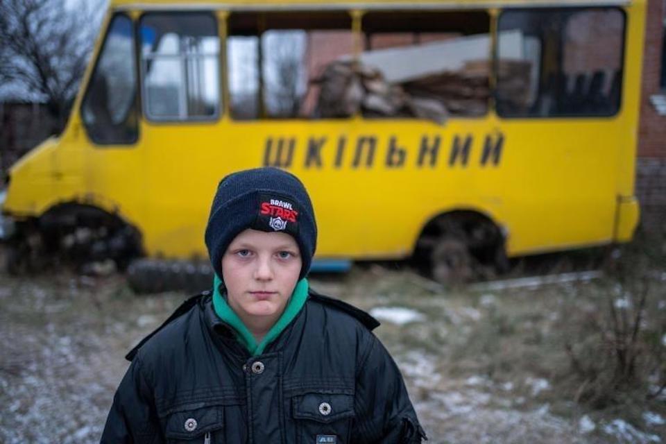 10-year-old Bohdan of Ukraine, who hasn't been able to go to school since the war started.