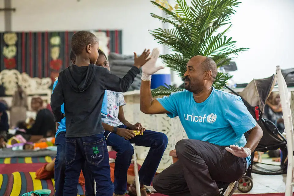On 8 June 2023, a UNICEF staff member engages with children who have been relocated from the Mygoma orphanage in Khartoum, Sudan.