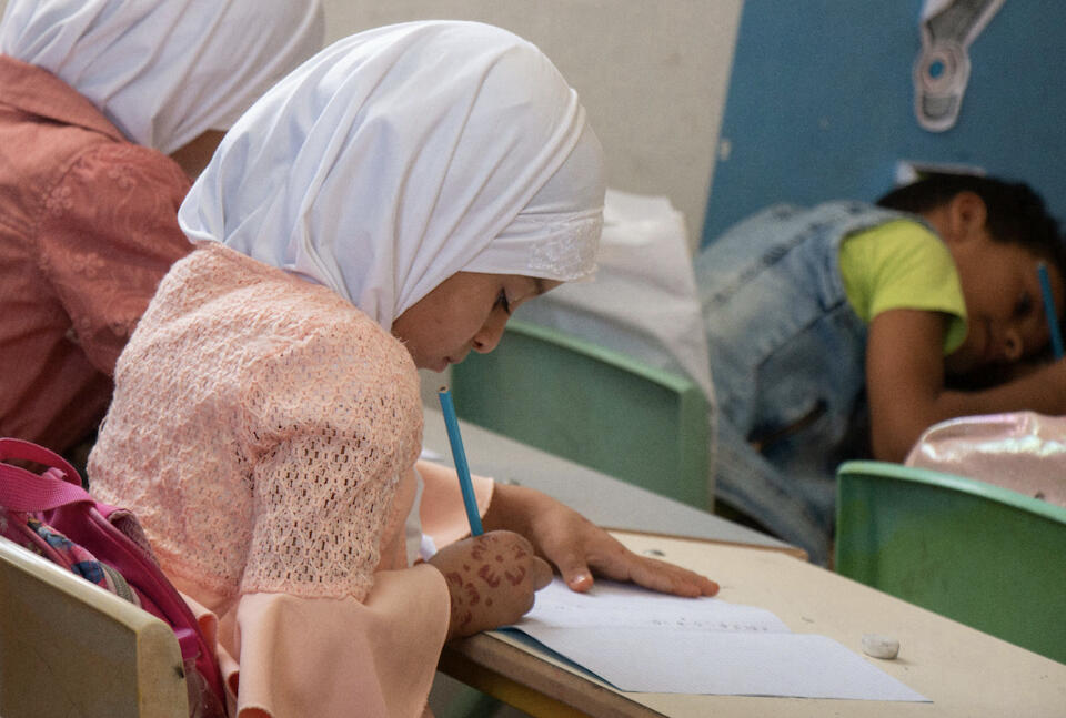 A young girl from Benghazi participates in a non-formal education program offered at a Baity Center, one of a number of such centers supported by UNICEF.