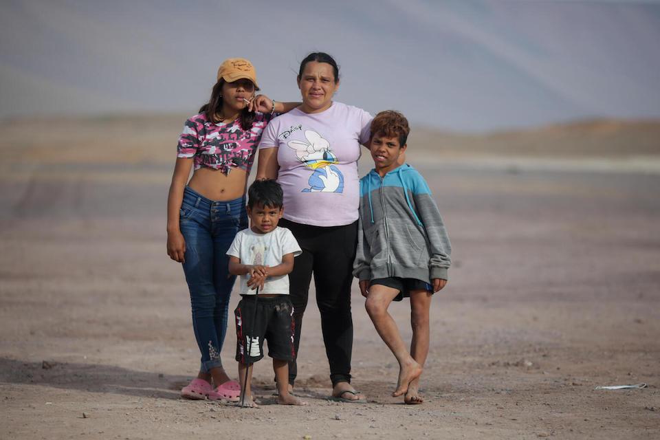 Yennifer Montiya, 32, and her children Yannelis, 13, Yendri, 10, and Brayan, 3 left Venezuela for Chile, where they are staying at a UNICEF-supported camp for migrant families in Playa Lobitos in Iquique, Chile.