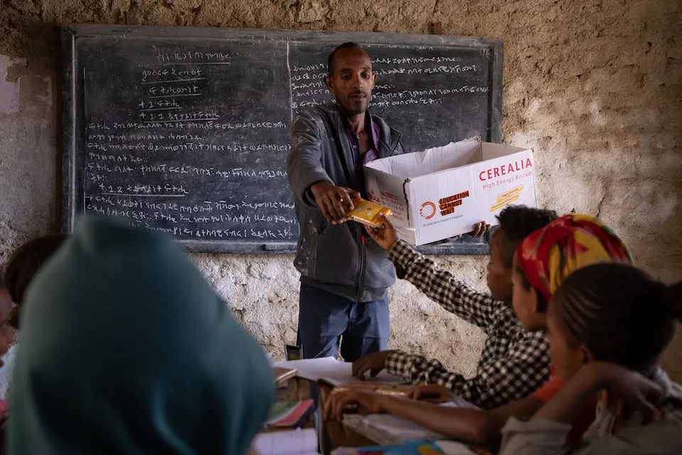 HIgh-energy biscuits are handed out to students at a school in Tigray, Ethiopia.