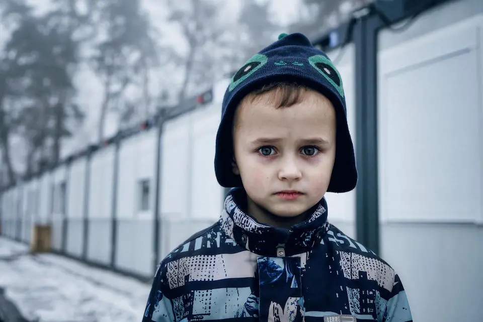 Davyd, 5, who fled his home near Kyiv with his mother and siblings when the war started, lives in a modular unit that is not well-equipped for winter weather.