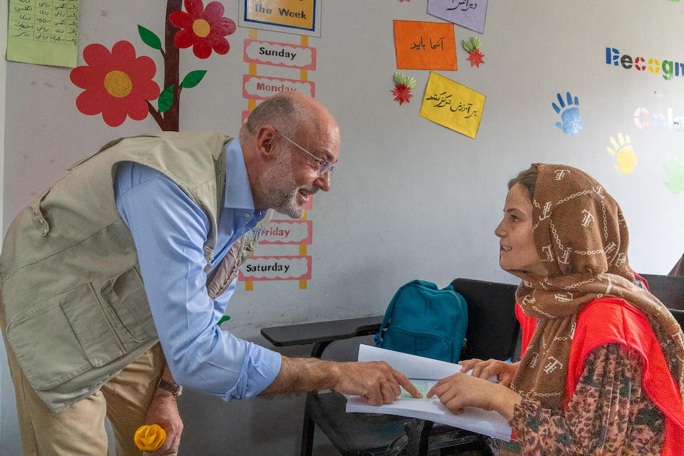 On Sept. 17, 2023, Fran Equiza, UNICEF Representative in Afghanistan, speaks with a girl receiving informal education at a UNICEF-supported transitional center in Badakhshan Province, Afghanistan.