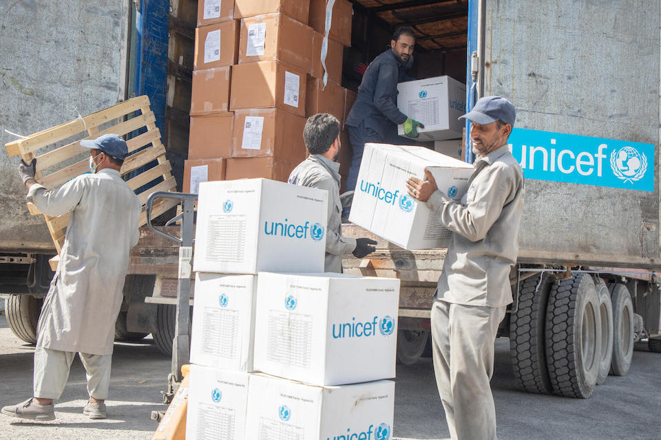 On Oct. 8,  2023, UNICEF workers loads cartons of family hygiene kits onto a truck for distribution to families affected by a deadly earthquake in western Afghanistan on Oct. 7..