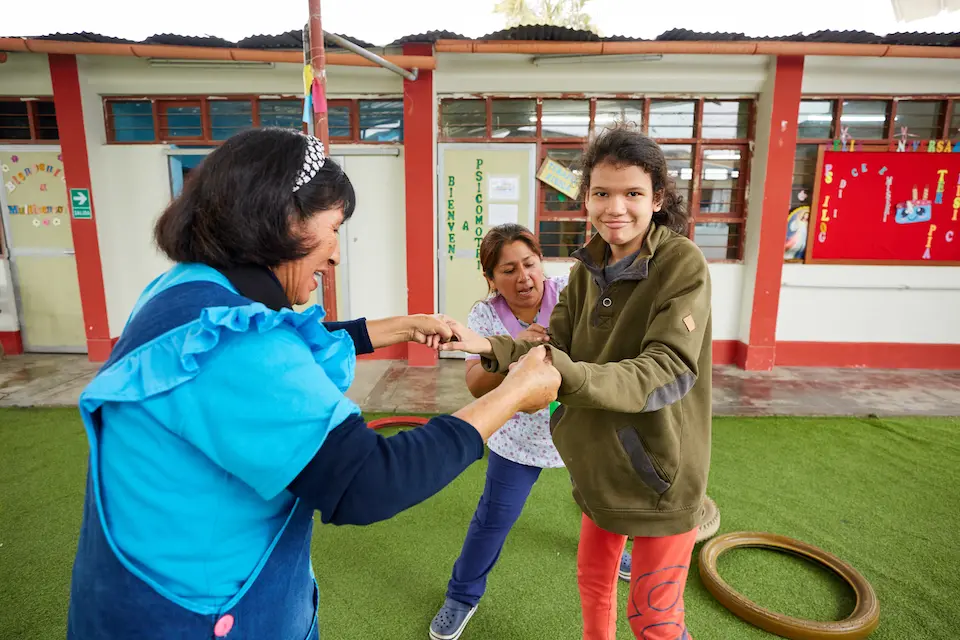 Anaís, far right, receives special services for children with disabilities at a UNICEF-supported school in Peru.